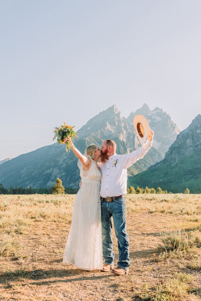 Jackson Hole vow renewal at Cathedral View Turnout intimate mountain vow renewal ceremony Wyoming 10 year anniversary vow renewal Grand Tetons beaded wedding dress mountain vow renewal Cathedral View Turnout vow renewal photographer Grand Teton National Park intimate wedding ceremony