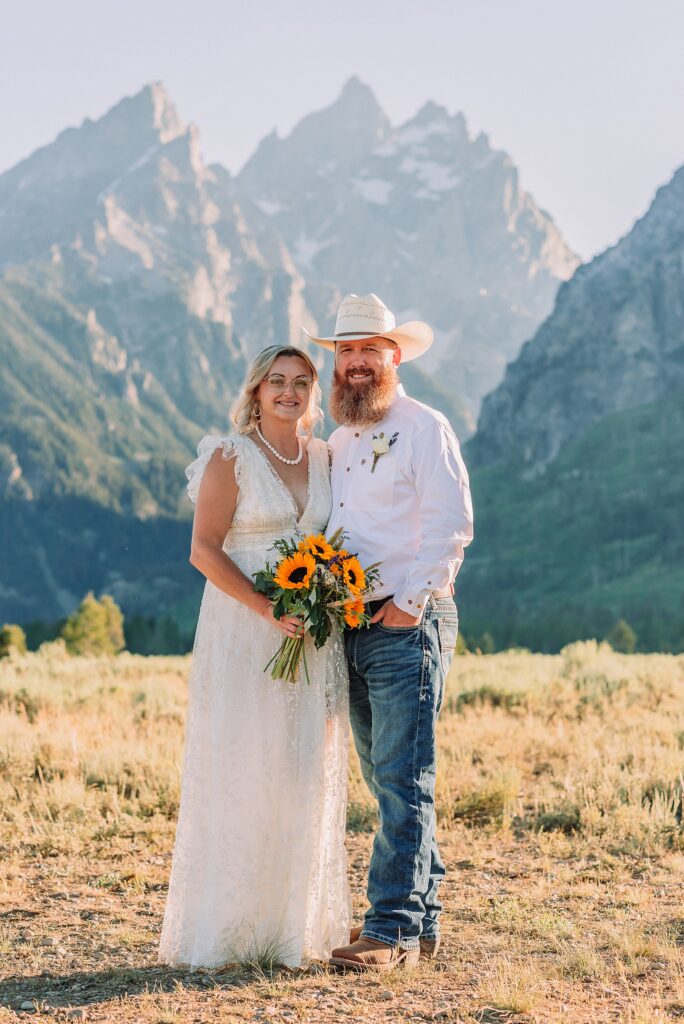 Jackson Hole vow renewal at Cathedral View Turnout intimate mountain vow renewal ceremony Wyoming 10 year anniversary vow renewal Grand Tetons beaded wedding dress mountain vow renewal Cathedral View Turnout vow renewal photographer Grand Teton National Park intimate wedding ceremony