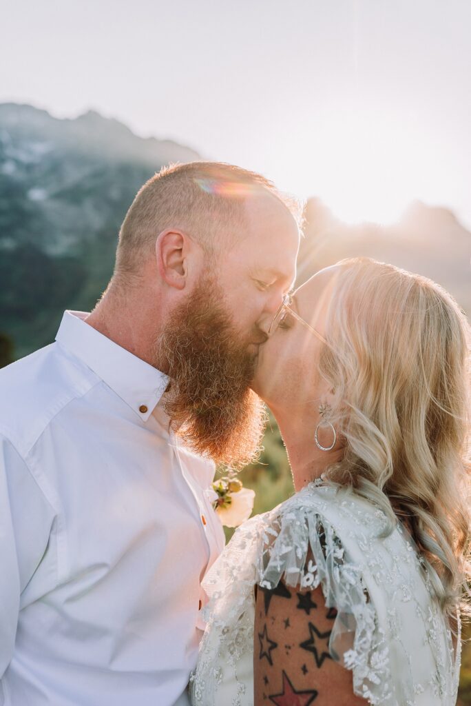 Jackson Hole vow renewal at Cathedral View Turnout intimate mountain vow renewal ceremony Wyoming 10 year anniversary vow renewal Grand Tetons beaded wedding dress mountain vow renewal Cathedral View Turnout vow renewal photographer Grand Teton National Park intimate wedding ceremony