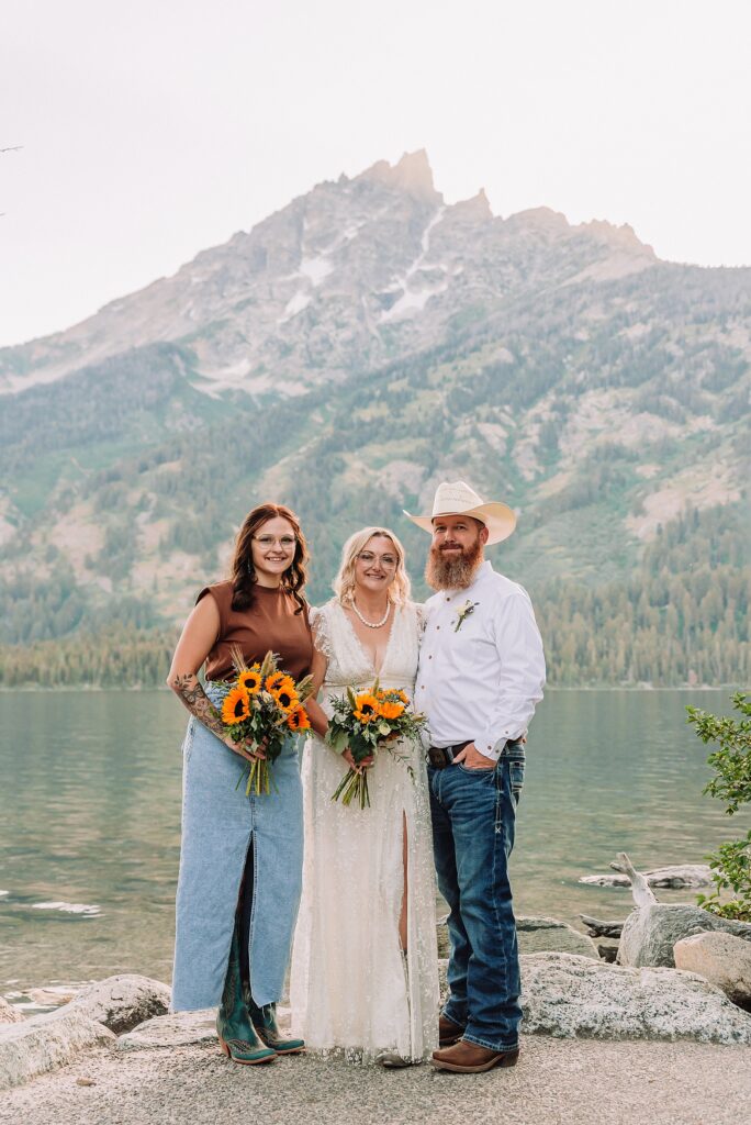 Jenny Lake vow renewal photography session romantic couples photos Jenny Lake Jackson Hole couple dancing in water Jenny Lake Wyoming mountain elopement with Teton backdrop Jackson Hole Photographer romantic Jackson Hole couple photography