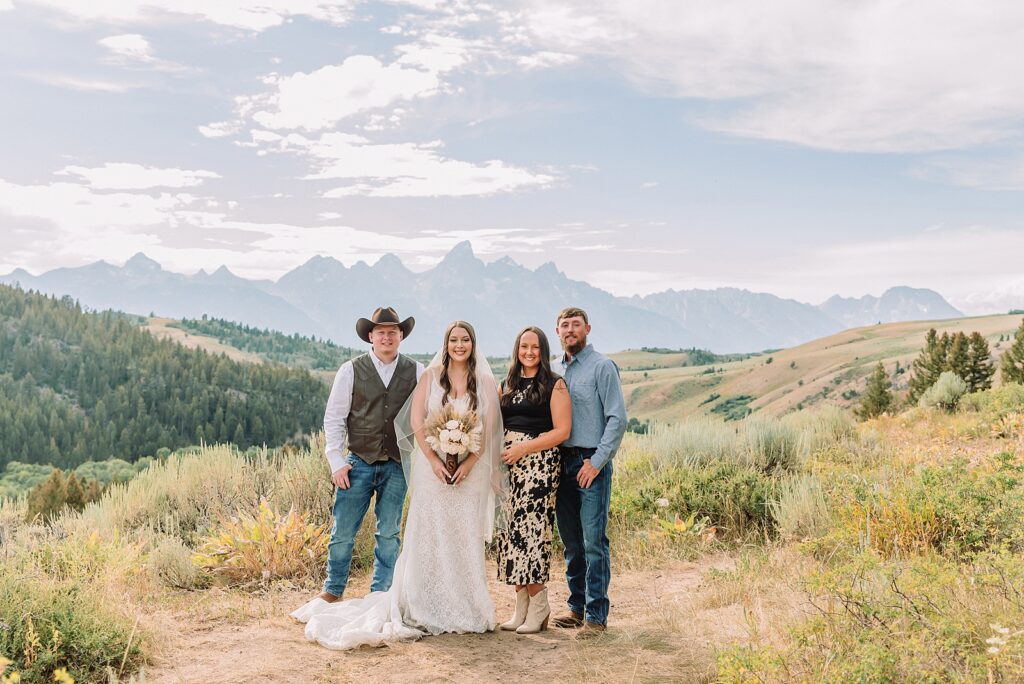 Bridger Teton National Forest outdoor wedding ceremony custom cowboy hat wedding surprise groom gift The Wedding Tree ceremony photos Wyoming champagne toast Grand Teton wedding celebration Jackson Hole Wedding Photographer