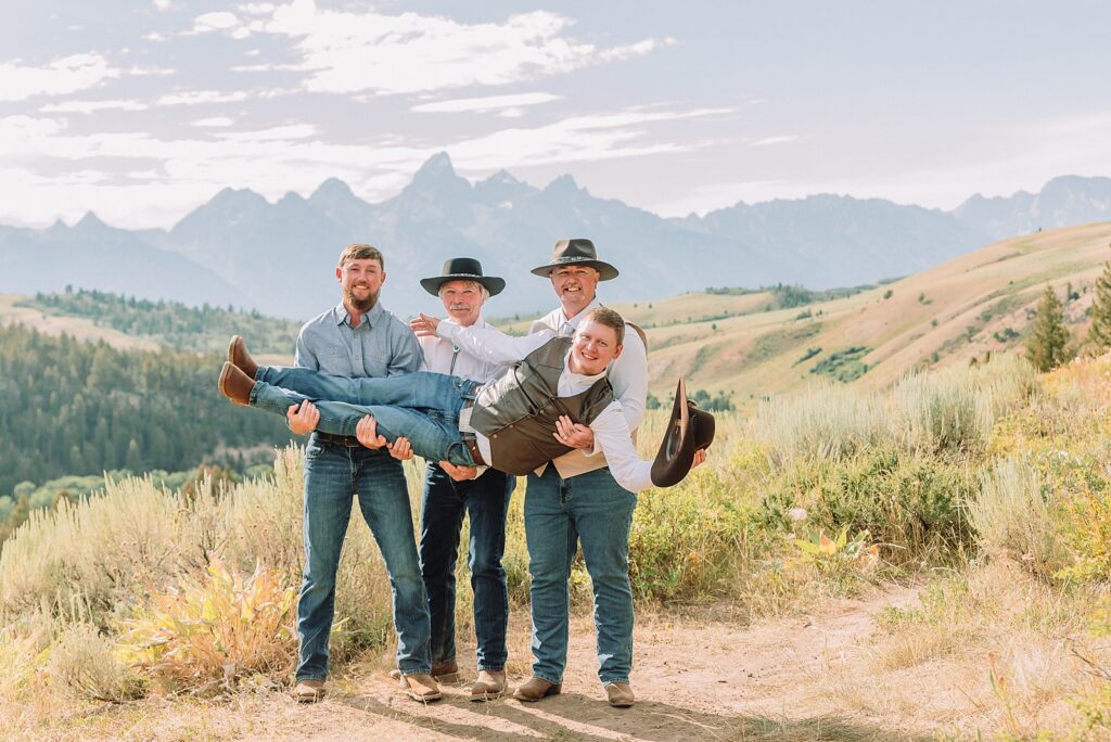 Bridger Teton National Forest outdoor wedding ceremony custom cowboy hat wedding surprise groom gift The Wedding Tree ceremony photos Wyoming champagne toast Grand Teton wedding celebration Jackson Hole Wedding Photographer