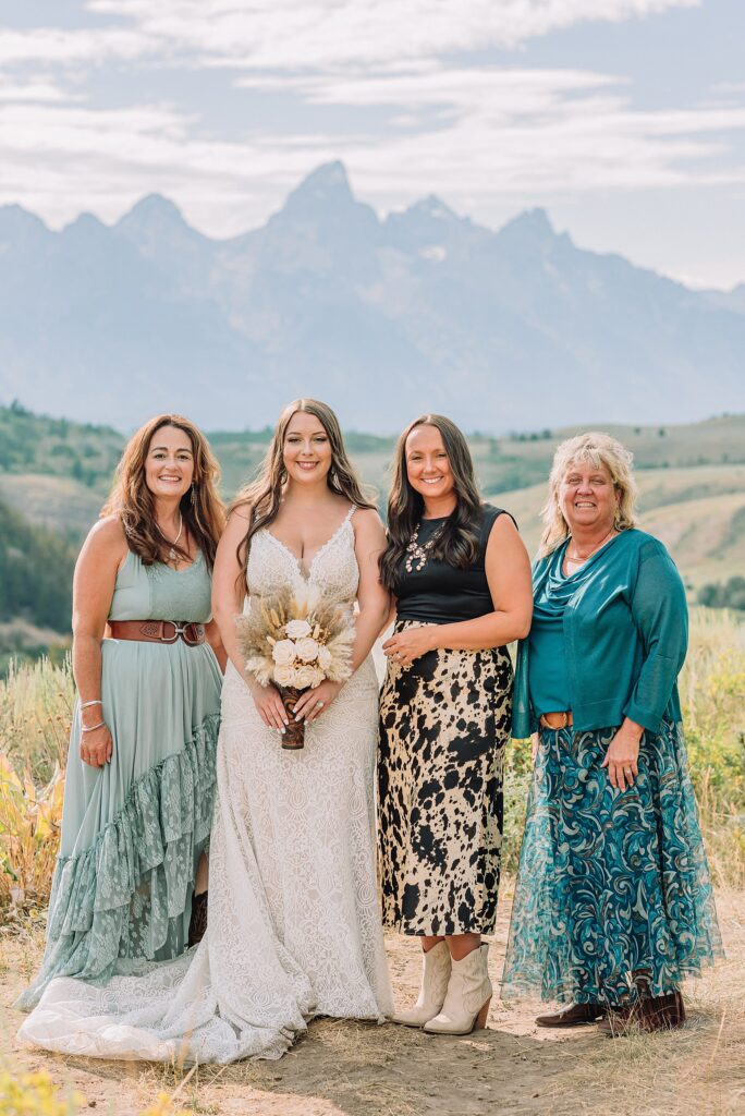 Bridger Teton National Forest outdoor wedding ceremony custom cowboy hat wedding surprise groom gift The Wedding Tree ceremony photos Wyoming champagne toast Grand Teton wedding celebration Jackson Hole Wedding Photographer