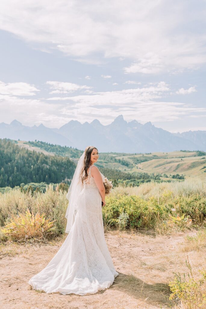 Bridger Teton National Forest outdoor wedding ceremony custom cowboy hat wedding surprise groom gift The Wedding Tree ceremony photos Wyoming champagne toast Grand Teton wedding celebration Jackson Hole Wedding Photographer