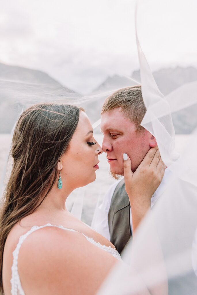 Jenny Lake Wyoming wedding photos mountain backdrop Grand Teton National Park wedding photography couple Teton mountain wedding photographer western style wedding tetons string Lake wedding photos