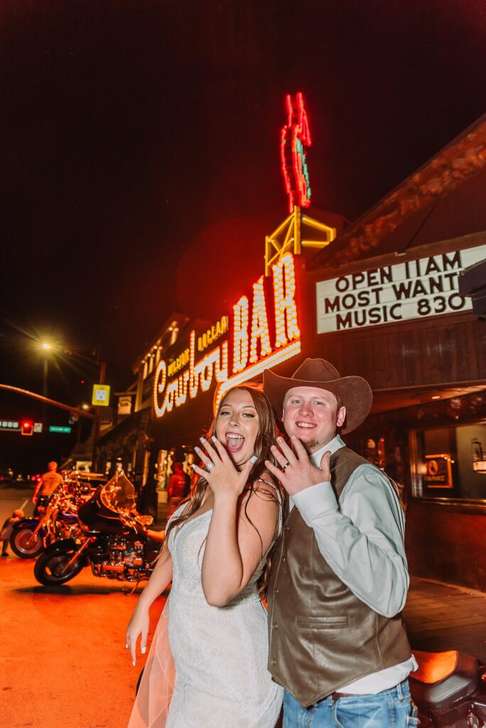 Million Dollar Cowboy Bar wedding photos Million Dollar Cowboy Bar neon sign wedding photos Jackson Hole Wedding Photographer