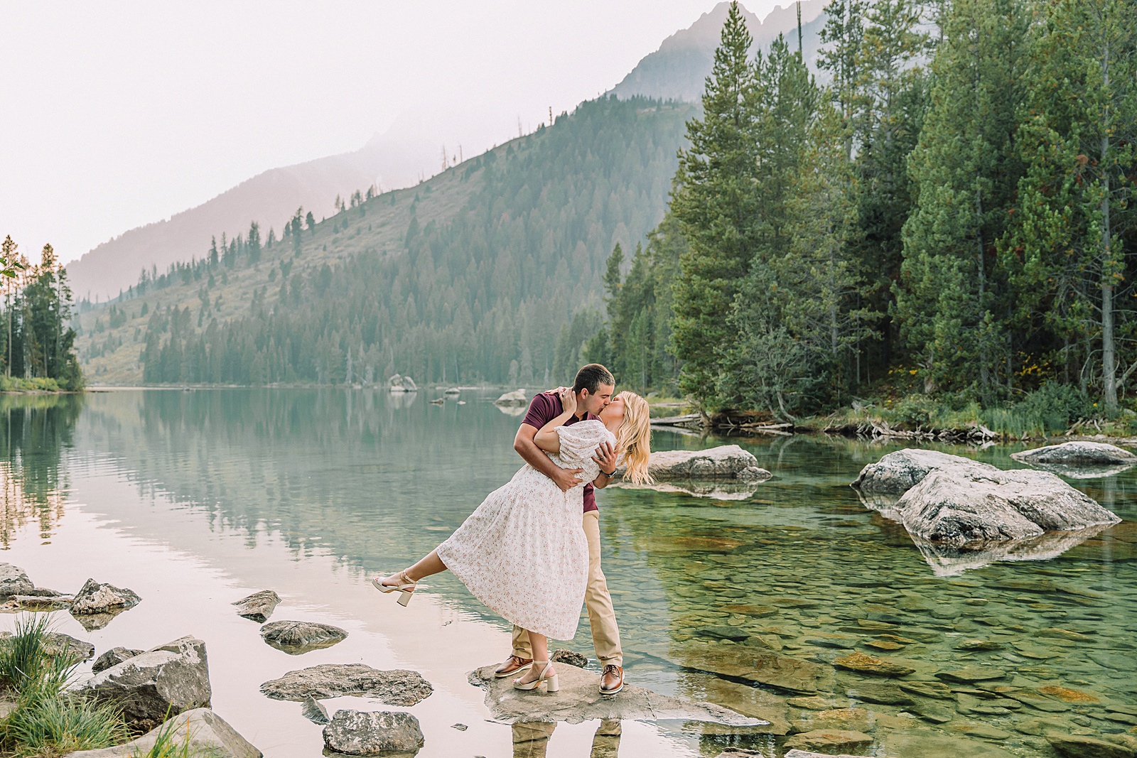 String Lake engagement photos in Grand Teton National Park Jackson Hole mountain engagement photography Teton engagement session at String Lake cream floral dress engagement photos Jackson Wyoming LDS temple wedding engagement photos Tetons fall engagement photo outfits Jackson Hole String Lake Wyoming couple photography session