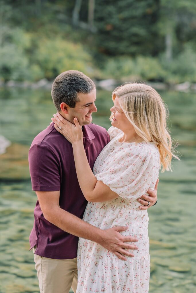 String Lake engagement photos in Grand Teton National Park Jackson Hole mountain engagement photography Teton engagement session at String Lake cream floral dress engagement photos Jackson Wyoming LDS temple wedding engagement photos Tetons fall engagement photo outfits Jackson Hole String Lake Wyoming couple photography session