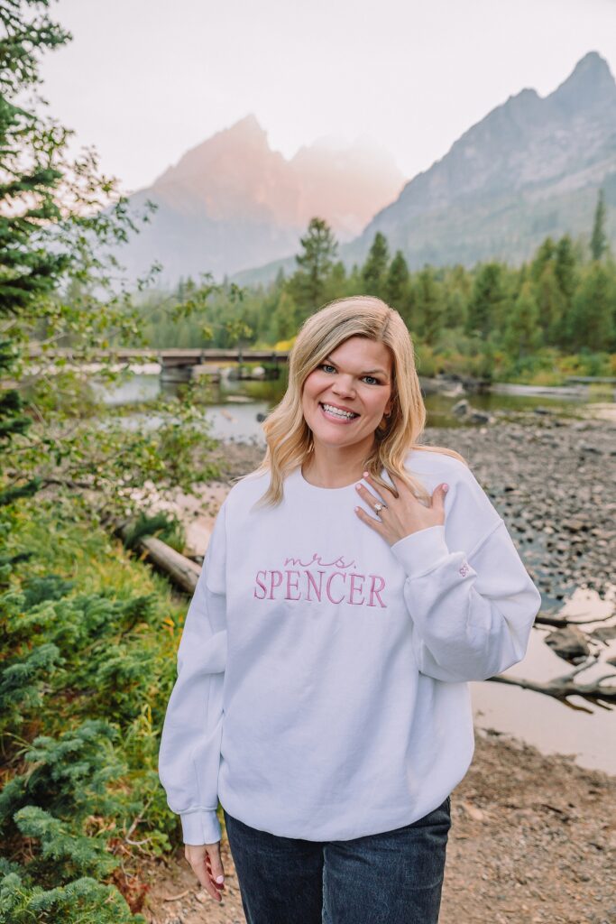 String Lake engagement photos in Grand Teton National Park Jackson Hole mountain engagement photography Teton engagement session at String Lake LDS temple wedding engagement photos Tetons fall engagement photo outfits Jackson Hole String Lake Wyoming couple photography session custom Mrs sweatshirt engagement pictures