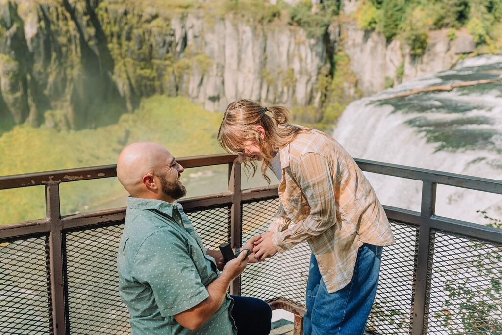 summer proposal photos Idaho waterfalls Mesa Falls boardwalk engagement session romantic Idaho Falls area proposal photos nature trail engagement photography Mesa Falls