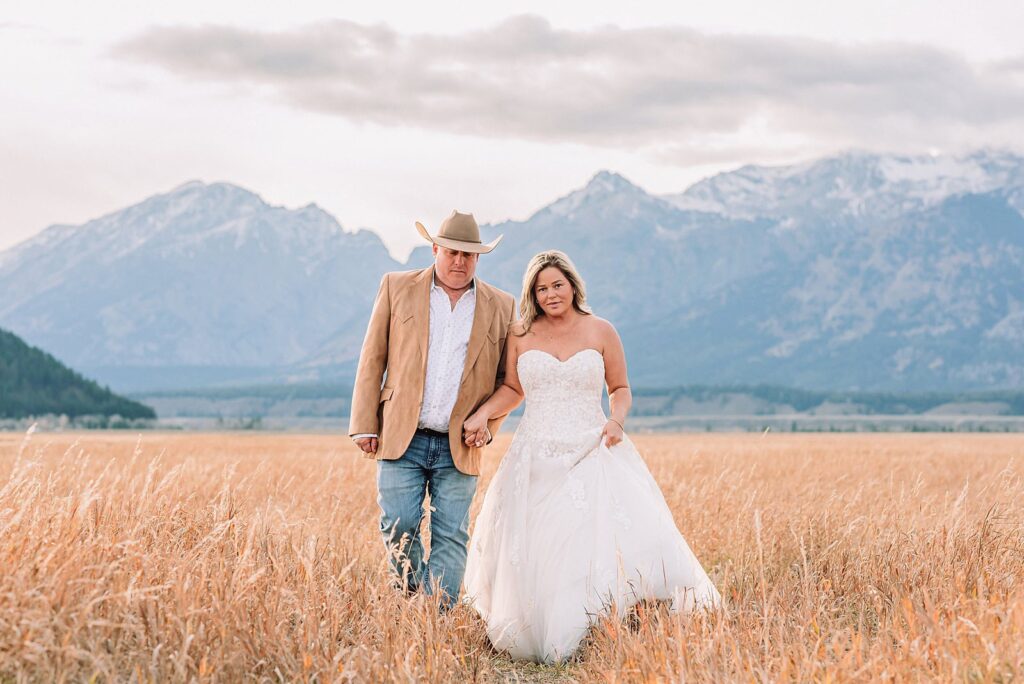 Schwabacher Landing elopement reflection photos elopement ceremony Jackson Hole October elopement at Mormon Row golden fields intimate Grand Teton elopement at Mormon Row