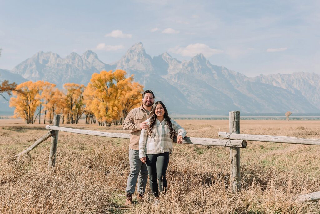 Grand Teton National Park proposal photographer Mormon Row barn proposal photos October proposal session in Jackson Hole surprise proposal at Mormon Row Tetons historic Mormon Row engagement session