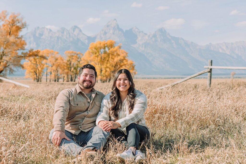 Grand Teton National Park proposal photographer Mormon Row barn proposal photos October proposal session in Jackson Hole surprise proposal at Mormon Row Tetons historic Mormon Row engagement session