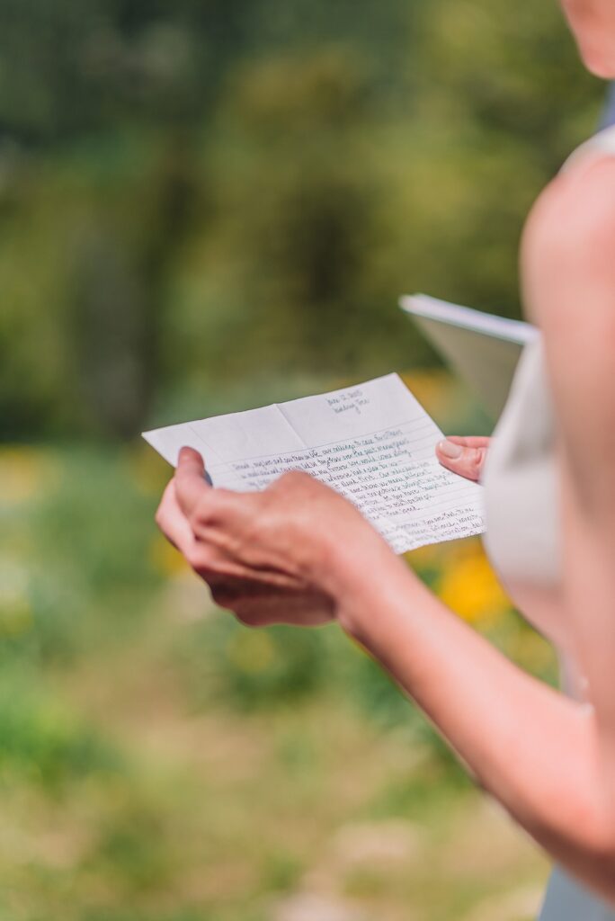 intimate Jackson Hole wedding photography The Wedding Tree ceremony photos Wyoming Wyoming mountain elopement at Wedding Tree June wildflower wedding ceremony Grand Tetons Wedding Tree elopement photographer Grand Teton National Park wildflower bouquet mountain wedding photography