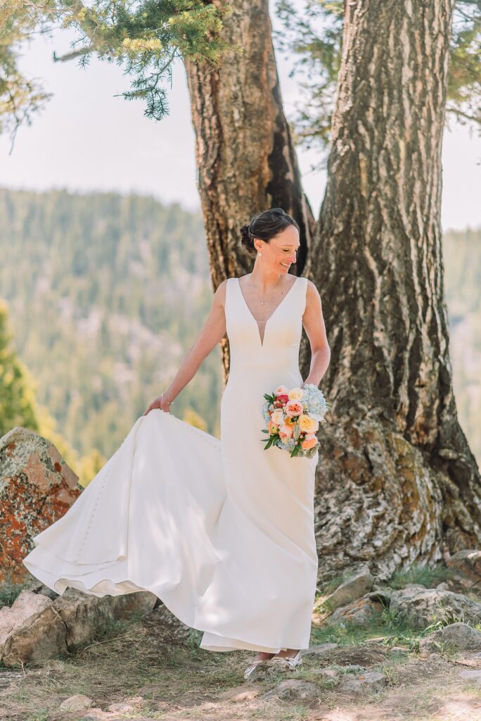 intimate Jackson Hole wedding photography The Wedding Tree ceremony photos Wyoming Wyoming mountain elopement at Wedding Tree June wildflower wedding ceremony Grand Tetons Wedding Tree elopement photographer Grand Teton National Park wildflower bouquet mountain wedding photography