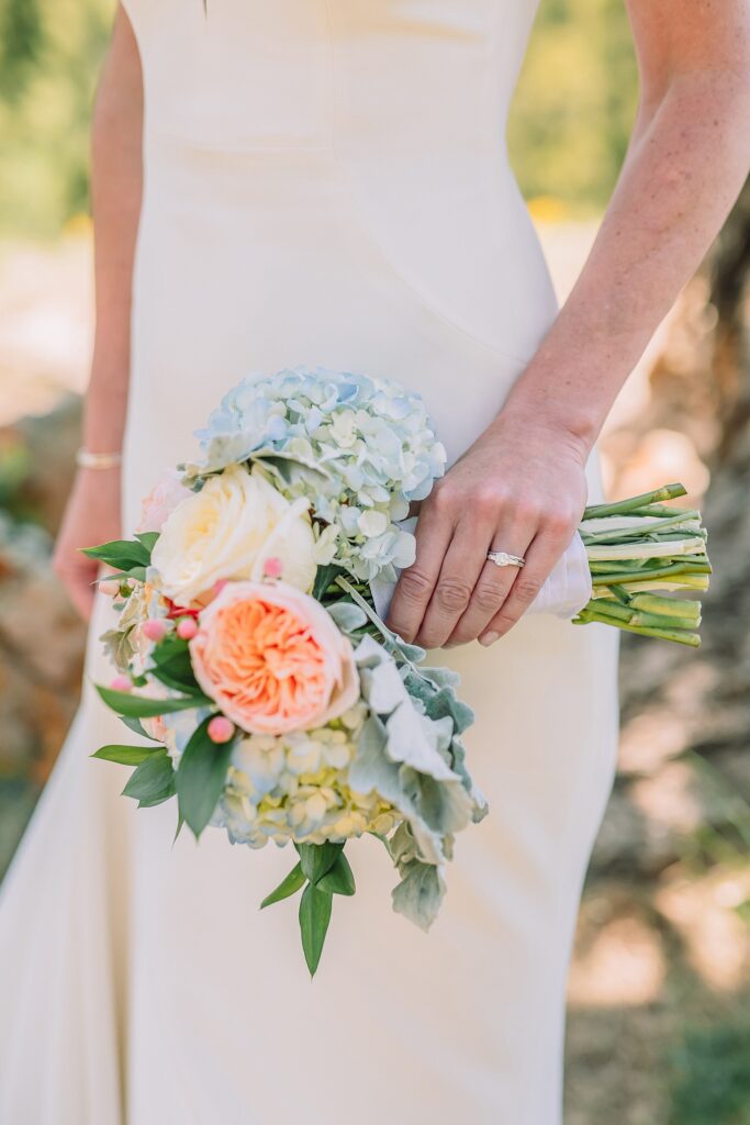 intimate Jackson Hole wedding photography The Wedding Tree ceremony photos Wyoming Wyoming mountain elopement at Wedding Tree June wildflower wedding ceremony Grand Tetons Wedding Tree elopement photographer Grand Teton National Park wildflower bouquet mountain wedding photography
