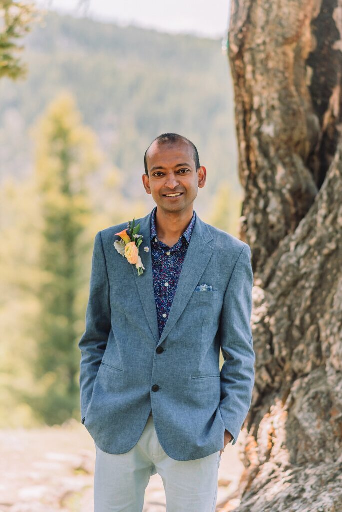 intimate Jackson Hole wedding photography The Wedding Tree ceremony photos Wyoming Wyoming mountain elopement at Wedding Tree June wildflower wedding ceremony Grand Tetons Wedding Tree elopement photographer Grand Teton National Park wildflower bouquet mountain wedding photography