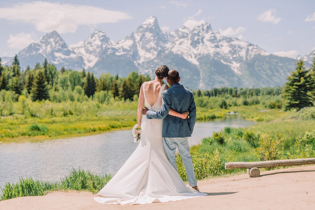 intimate elopement photography Schwabacher Landing champagne toast at Wyoming elopement personalized coffee mug elopement surprise mountain wedding with snow capped Teton peaks Jackson Hole destination wedding photographer Grand Teton elopement photography session