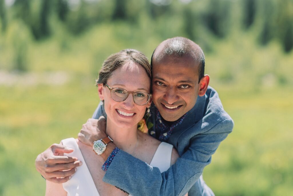 intimate elopement photography Schwabacher Landing champagne toast at Wyoming elopement personalized coffee mug elopement surprise mountain wedding with snow capped Teton peaks Jackson Hole destination wedding photographer Grand Teton elopement photography session