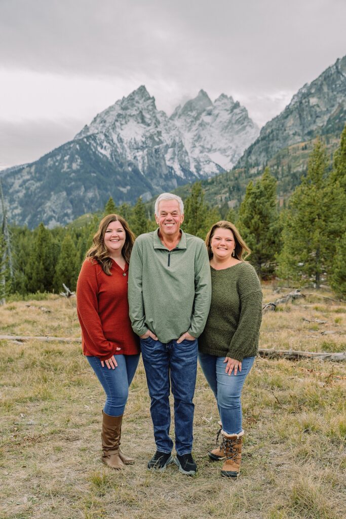 extended family photos in Jackson Hole Wyoming String Lake family photography session Jackson Hole multi generational family portraits in the mountains Grand Teton National Park family photographer windy mountain family session Jackson Hole Arizona family visiting Jackson Hole photos three generation family photos at String Lake Jackson Hole extended family photographer
