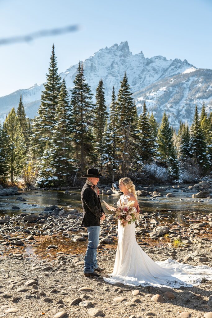Grand Teton National Park wedding photography October Jenny Lake elopement photos with snow Jackson Hole Wedding Photos Lakeside wedding portraits in late Fall