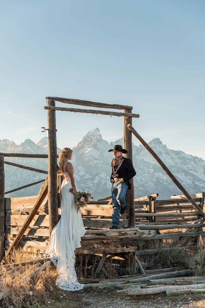 Mormon Row wedding portraits golden hour Rustic mountain wedding with Teton backdrop Cowboy themed groom style mountain wedding Vintage barn wedding photos Jackson Hole