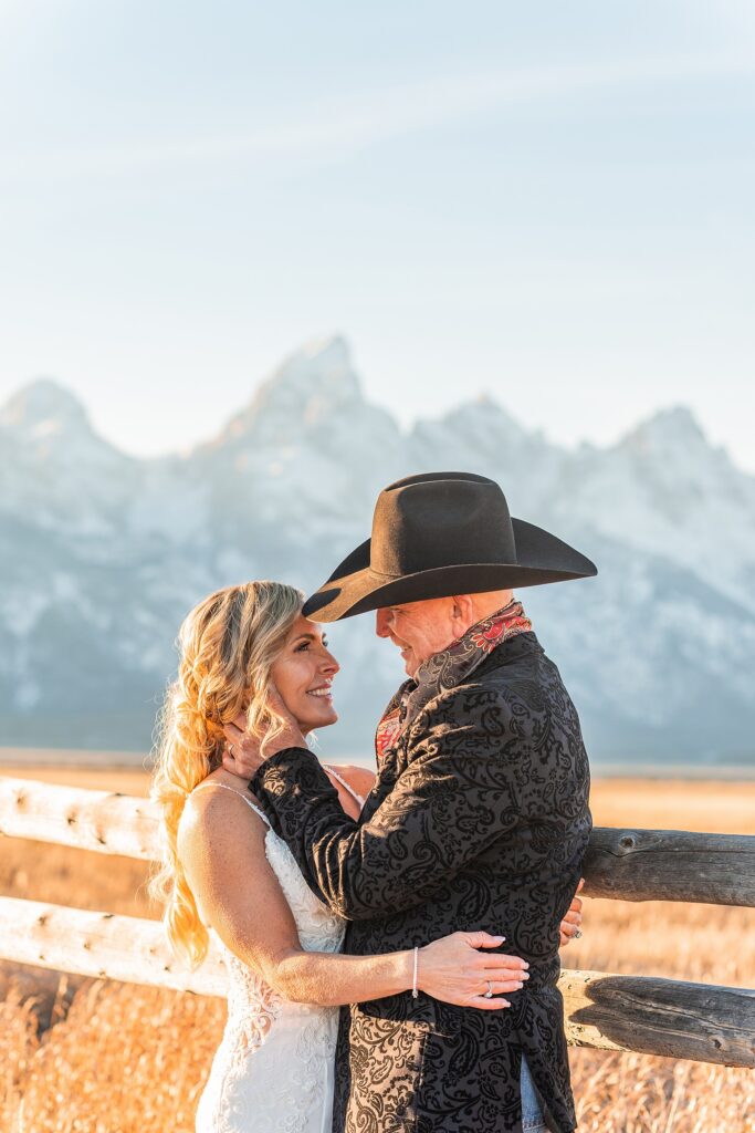 Mormon Row wedding portraits golden hour Rustic mountain wedding with Teton backdrop Cowboy themed groom style mountain wedding Vintage barn wedding photos Jackson Hole