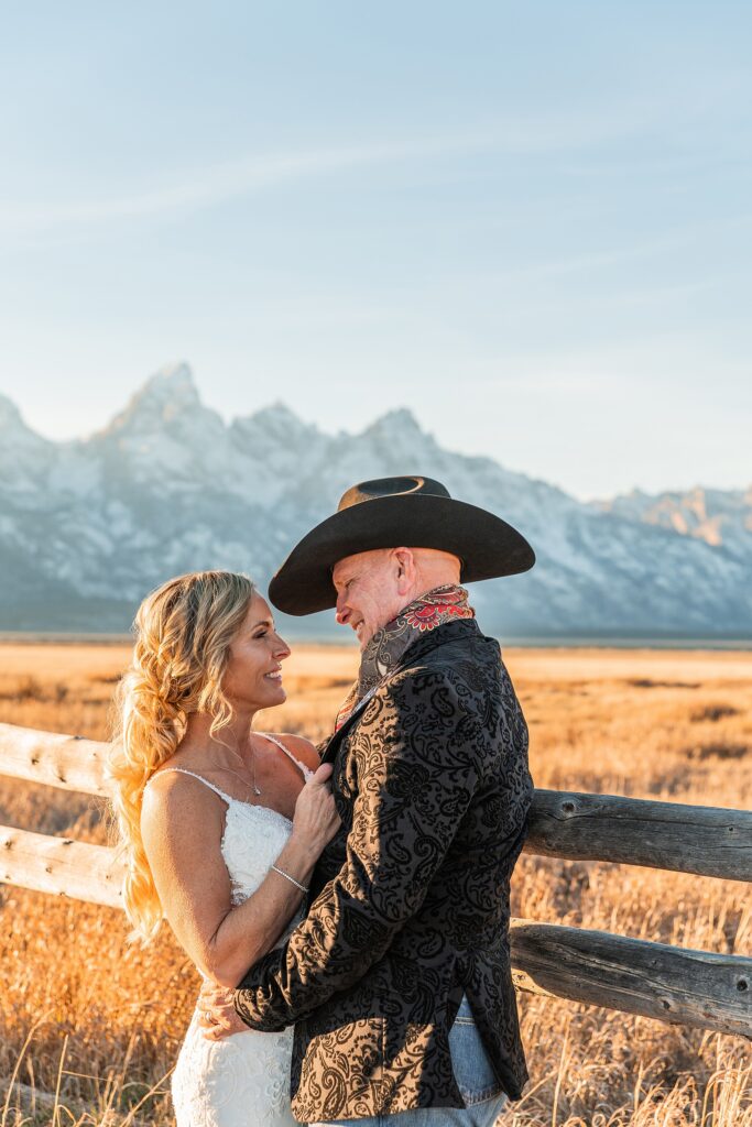 Mormon Row wedding portraits golden hour Rustic mountain wedding with Teton backdrop Cowboy themed groom style mountain wedding Vintage barn wedding photos Jackson Hole