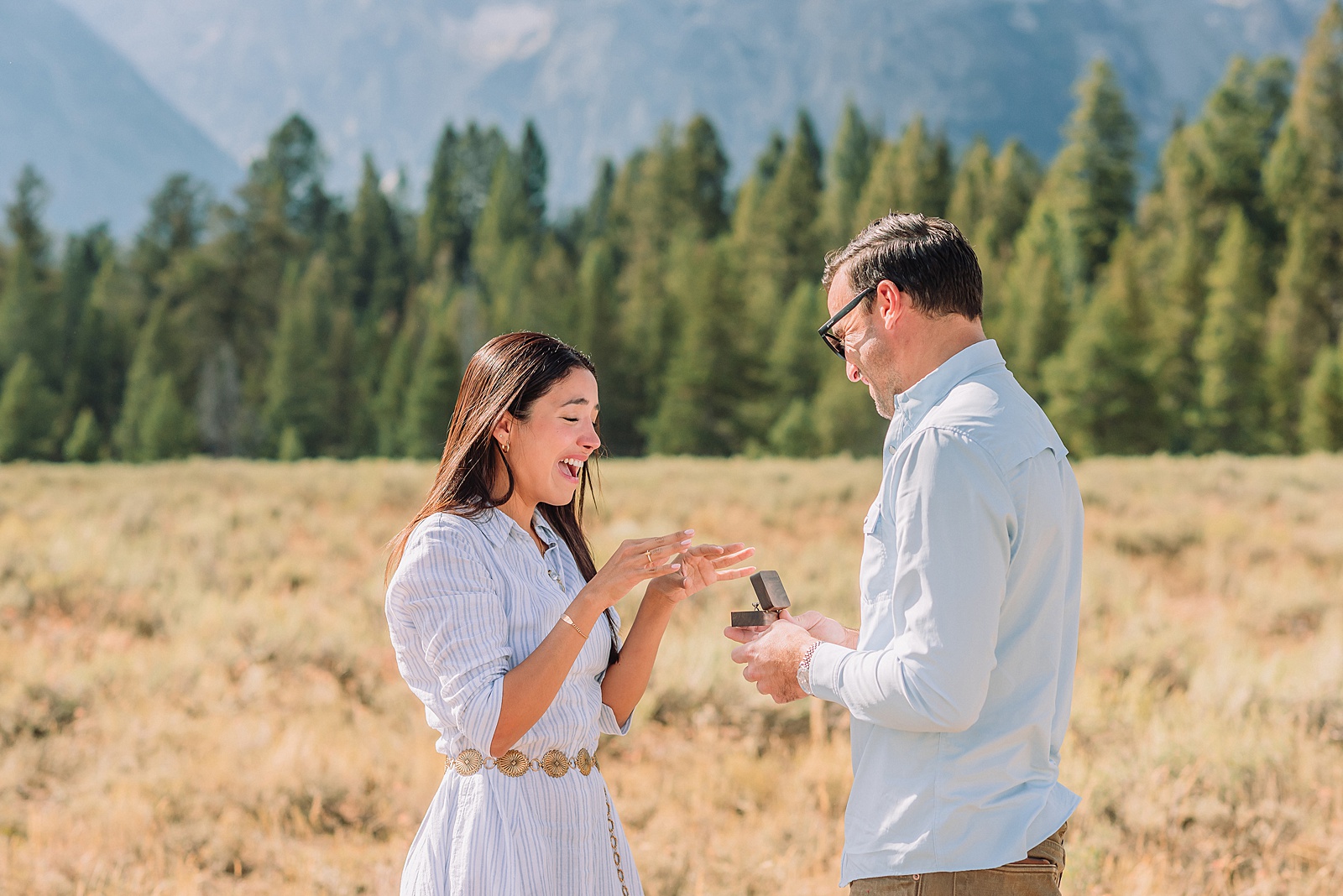 Engagements in the Tetons cathedral view turnout engagement session grand teton national park proposal photography august proposal grand teton wyoming intimate mountain proposal photography