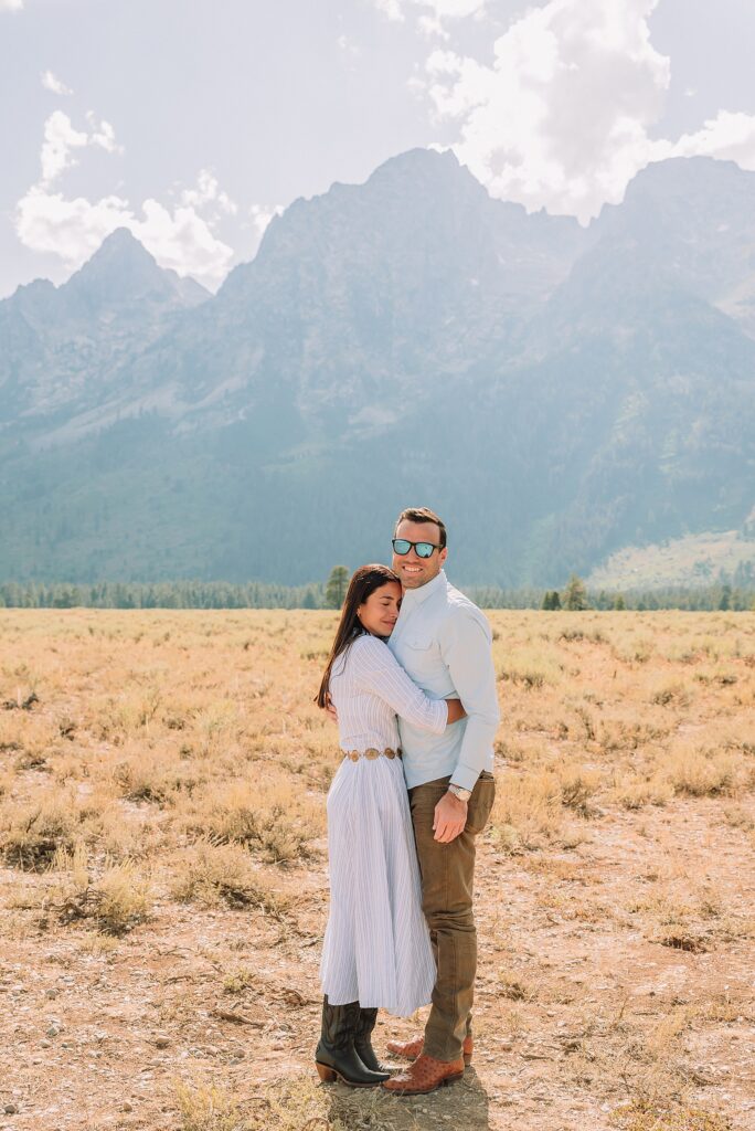 Engagements in the Tetons cathedral view turnout engagement session grand teton national park proposal photography august proposal grand teton wyoming intimate mountain proposal photography