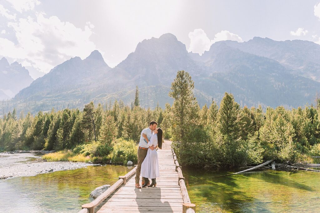 Jackson Hole Engagement Photographer string lake engagement photos grand teton lakeside couple photos grand teton national park western style engagement session tetons bridge engagement photos string lake