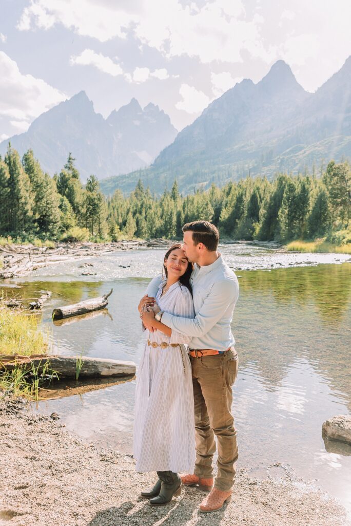 Jackson Hole Engagement Photographer string lake engagement photos grand teton lakeside couple photos grand teton national park western style engagement session tetons bridge engagement photos string lake
