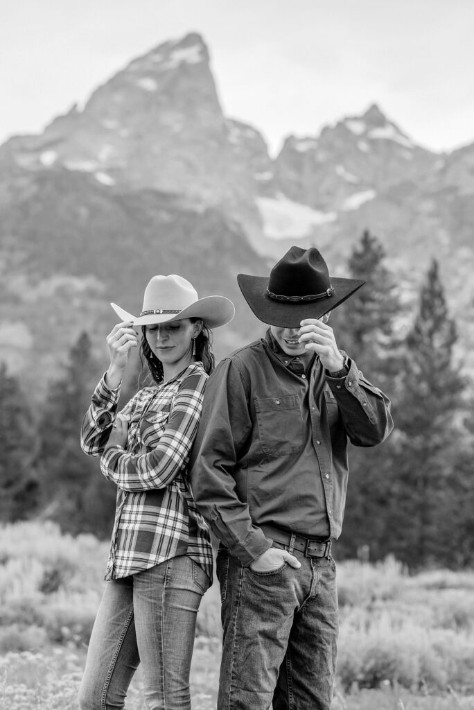 outdoor family photos with baby Grand Tetons purple western shirt family portraits Wyoming cream plaid toddler outdoor photos mountains flexible outdoor photography session inclement weather Jackson Hole Photographer Grand Teton National Park family photographer
