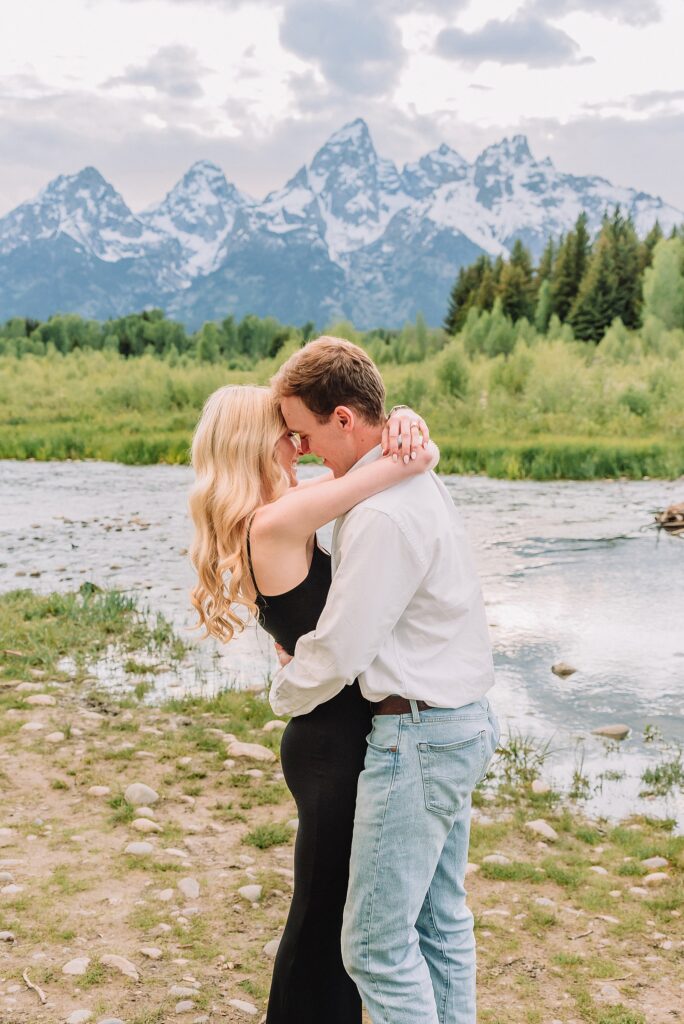 Grand Teton proposal photographer Schwabacher Landing surprise riverside proposal Grand Teton National Park early summer engagement photos Jackson Hole Wyoming mountain backdrop proposal photography Grand Tetons Schwabacher Landing proposal session June natural light proposal photos Grand Teton mountains