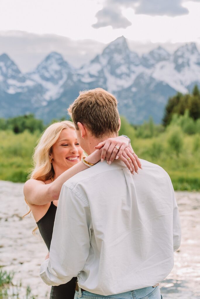 Grand Teton proposal photographer Schwabacher Landing surprise riverside proposal Grand Teton National Park early summer engagement photos Jackson Hole Wyoming mountain backdrop proposal photography Grand Tetons proposal photos grand tetons
