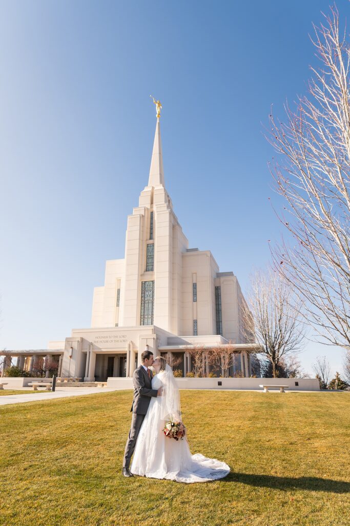 Rexburg Idaho Temple wedding photography in November LDS temple wedding photographer Rexburg Idaho bride getting ready at The Aisle venue Sugar City Idaho bridal party getting ready Sugar City Idaho wedding venue father daughter first look before LDS temple wedding ring ceremony with family and friends Idaho wedding sparkler exit with light sticks at Idaho wedding reception November wedding photography Rexburg Idaho no snow