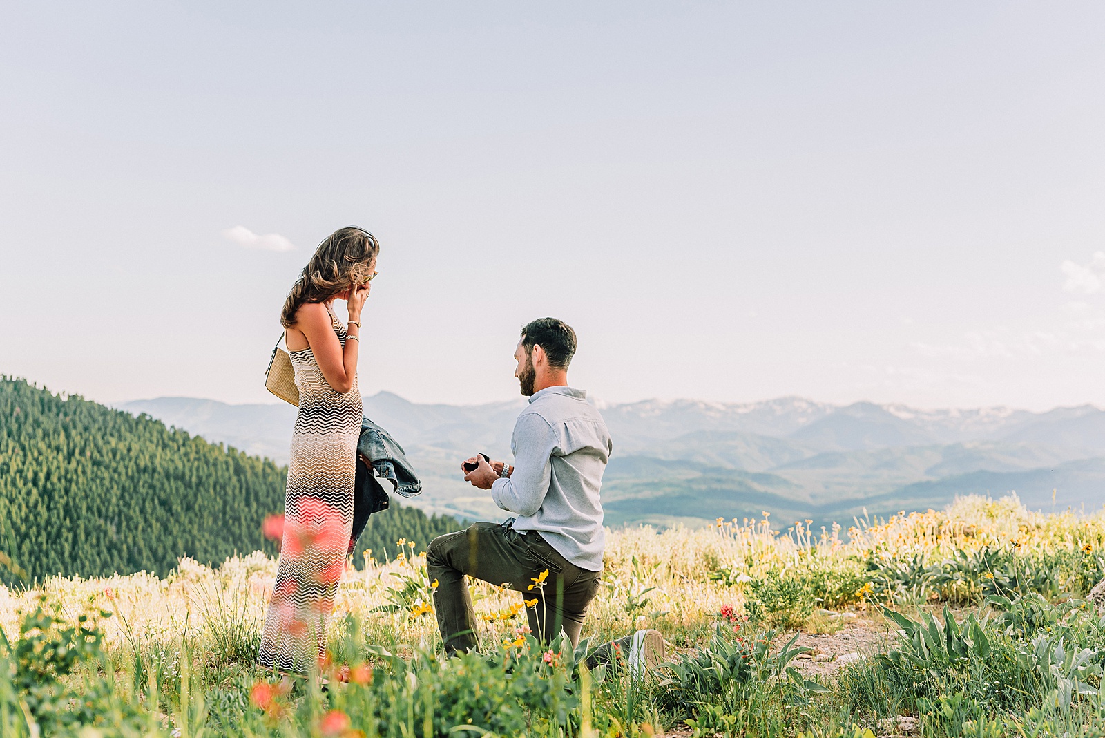 Snow King Mountain surprise proposal photography Jackson Hole wildflower engagement photos gondola engagement session Wyoming Snow King resort proposal photographer wildflower engagement photos Wyoming