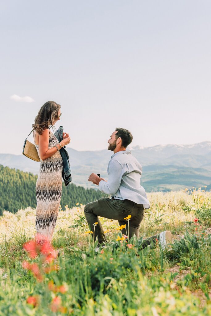 Snow King Mountain surprise proposal photography Jackson Hole wildflower engagement photos gondola engagement session Wyoming Snow King resort proposal photographer wildflower engagement photos Wyoming