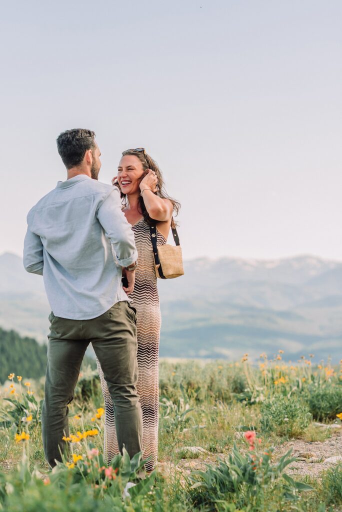 Snow King Mountain surprise proposal photography Jackson Hole wildflower engagement photos gondola engagement session Wyoming Snow King resort proposal photographer wildflower engagement photos Wyoming