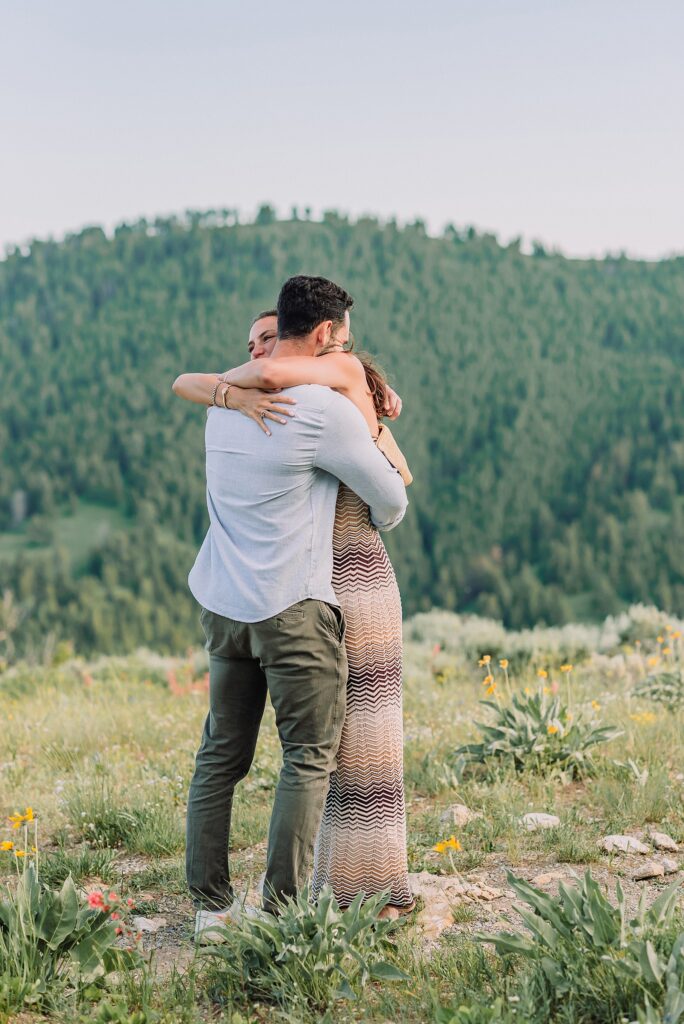 Snow King Mountain surprise proposal photography Jackson Hole wildflower engagement photos gondola engagement session Wyoming Snow King resort proposal photographer wildflower engagement photos Wyoming