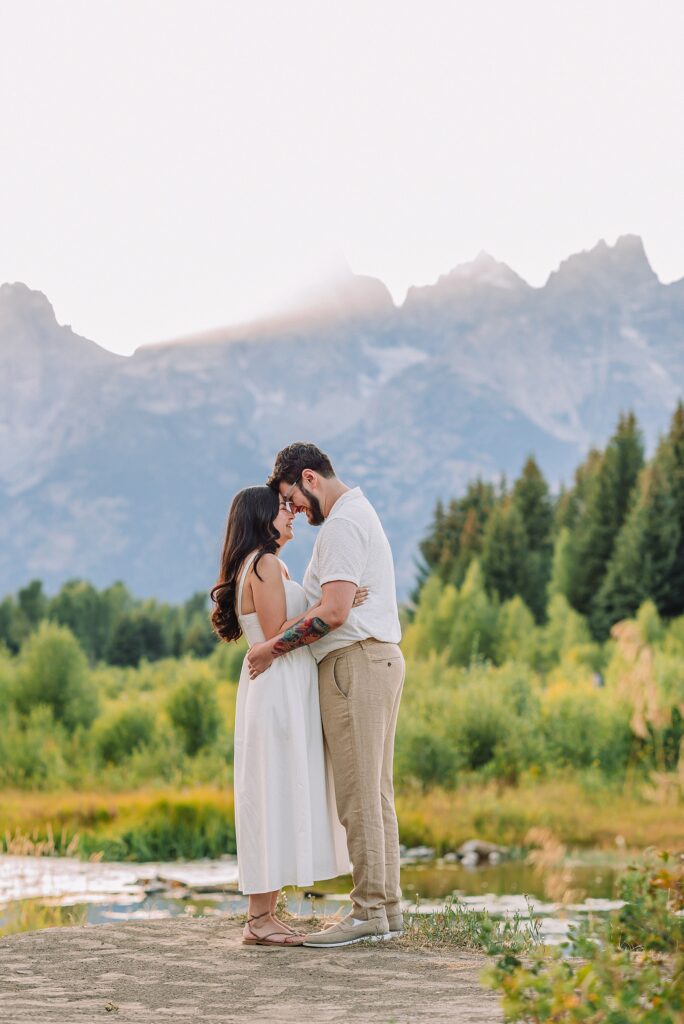 dreamy lighting engagement photography Jackson Hole area romantic Schwabacher Landing couples photography session Grand Teton National Park fall engagement pictures candid mountain engagement photos natural posing Wyoming Jackson Hole Photographer