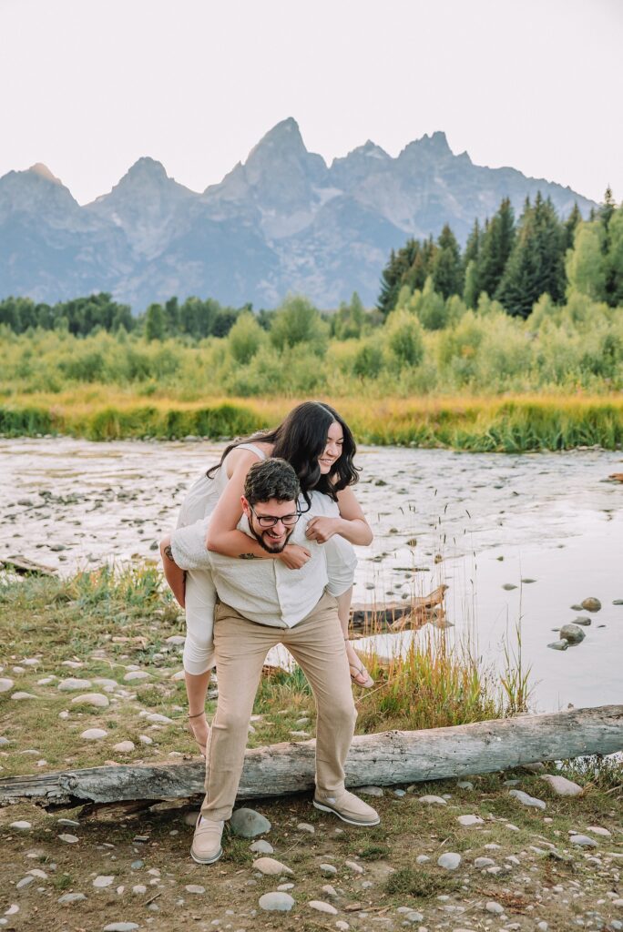 dreamy lighting engagement photography Jackson Hole area romantic Schwabacher Landing couples photography session Grand Teton National Park fall engagement pictures candid mountain engagement photos natural posing Wyoming Jackson Hole Photographer
