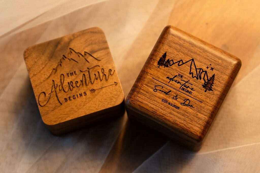 getting ready photos Teton Mountain Lodge Spa bride pre-wedding photos Bridal prep at Jackson Hole resort vow books and rings custom ring boxes