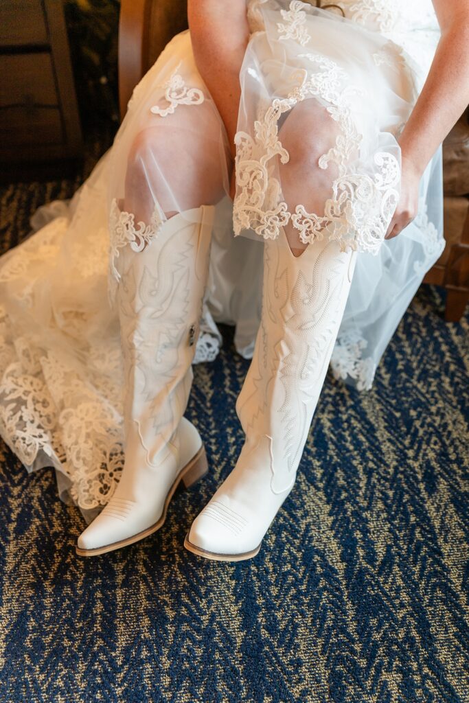 getting ready photos Teton Mountain Lodge Spa bride pre-wedding photos Bridal prep at Jackson Hole resort vow books and rings custom ring boxes