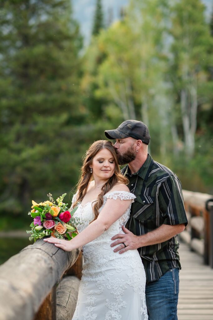 Jenny Lake sunset elopement portraits lace wedding gown Teton Mountains elopement Lakeshore wedding photos in Jackson Hole