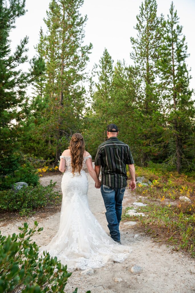 Jenny Lake sunset elopement portraits lace wedding gown Teton Mountains elopement Lakeshore wedding photos in Jackson Hole