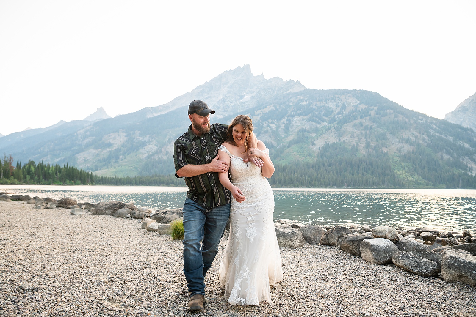 Jenny Lake sunset elopement portraits lace wedding gown Teton Mountains elopement Lakeshore wedding photos in Jackson Hole
