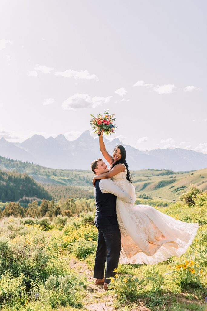 Bridger-Teton National Forest wedding ceremony photography The Wedding Tree elopement portraits Jackson Hole June wildflower wedding photography Wyoming mountains candid elopement photography Teton Range backdrop Jackson Hole Wedding Photographer Teton Mountains Wedding Photography