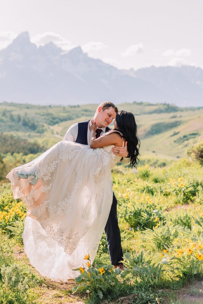 Bridger-Teton National Forest wedding ceremony photography The Wedding Tree elopement portraits Jackson Hole June wildflower wedding photography Wyoming mountains candid elopement photography Teton Range backdrop Jackson Hole Wedding Photographer Teton Mountains Wedding Photography