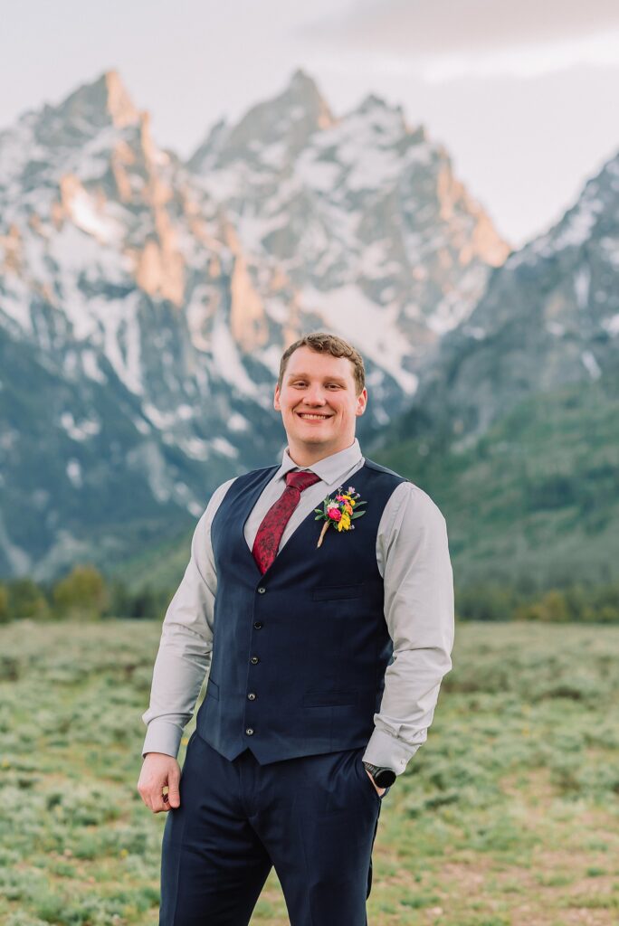 Cathedral View Turnout couple photos Grand Tetons candid elopement photography Teton Range backdrop playful elopement photos Grand Teton National Park intimate couple portraits Jackson Hole Wyoming outdoor wedding ceremony mountain backdrop photography